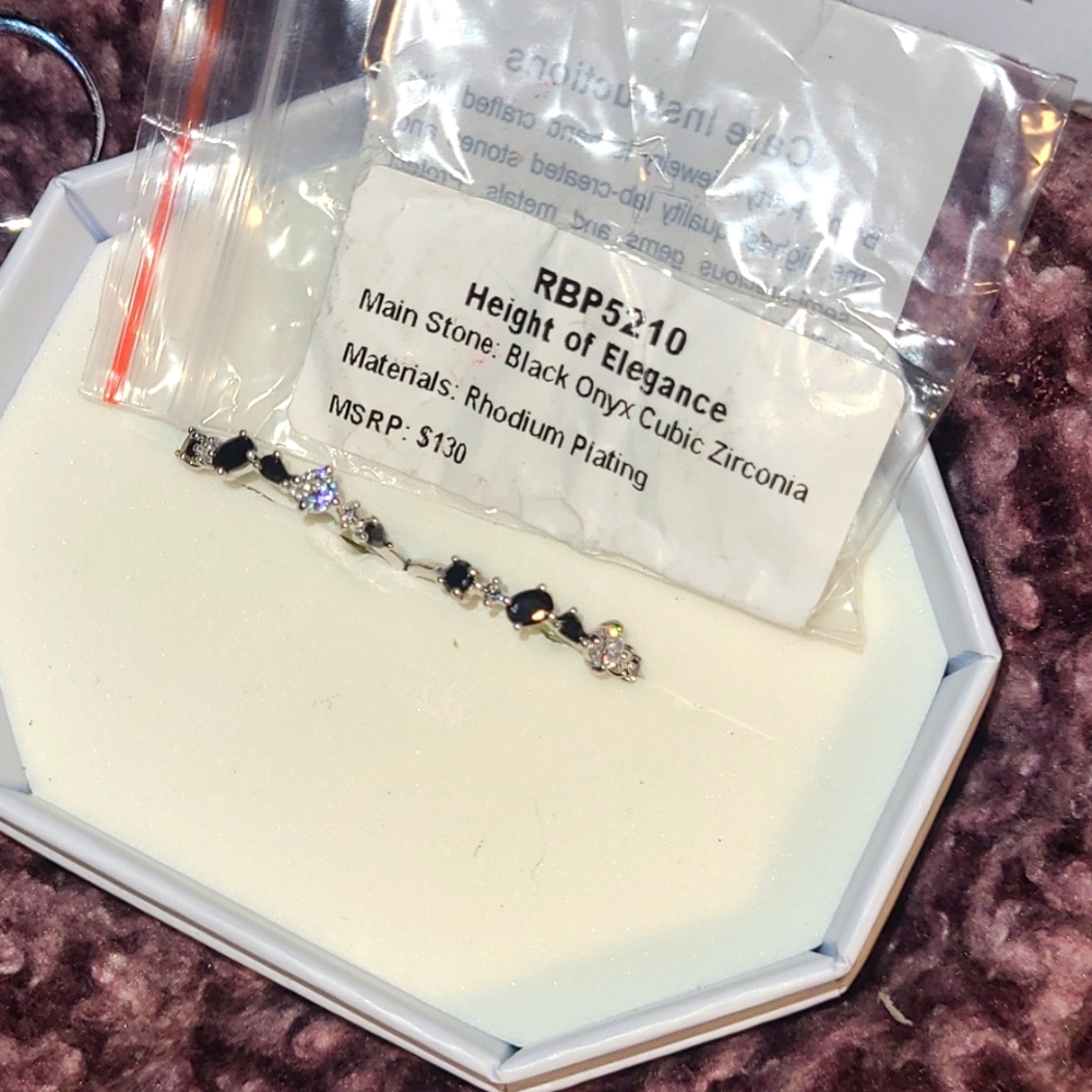 Beautiful Black onyx cubic Zirconia, rhodium plated 2 ring set.